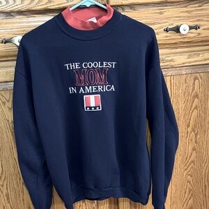 WOMENS SWEATSHIRT SZ LARGE
NAVY BLUE WITH RED
